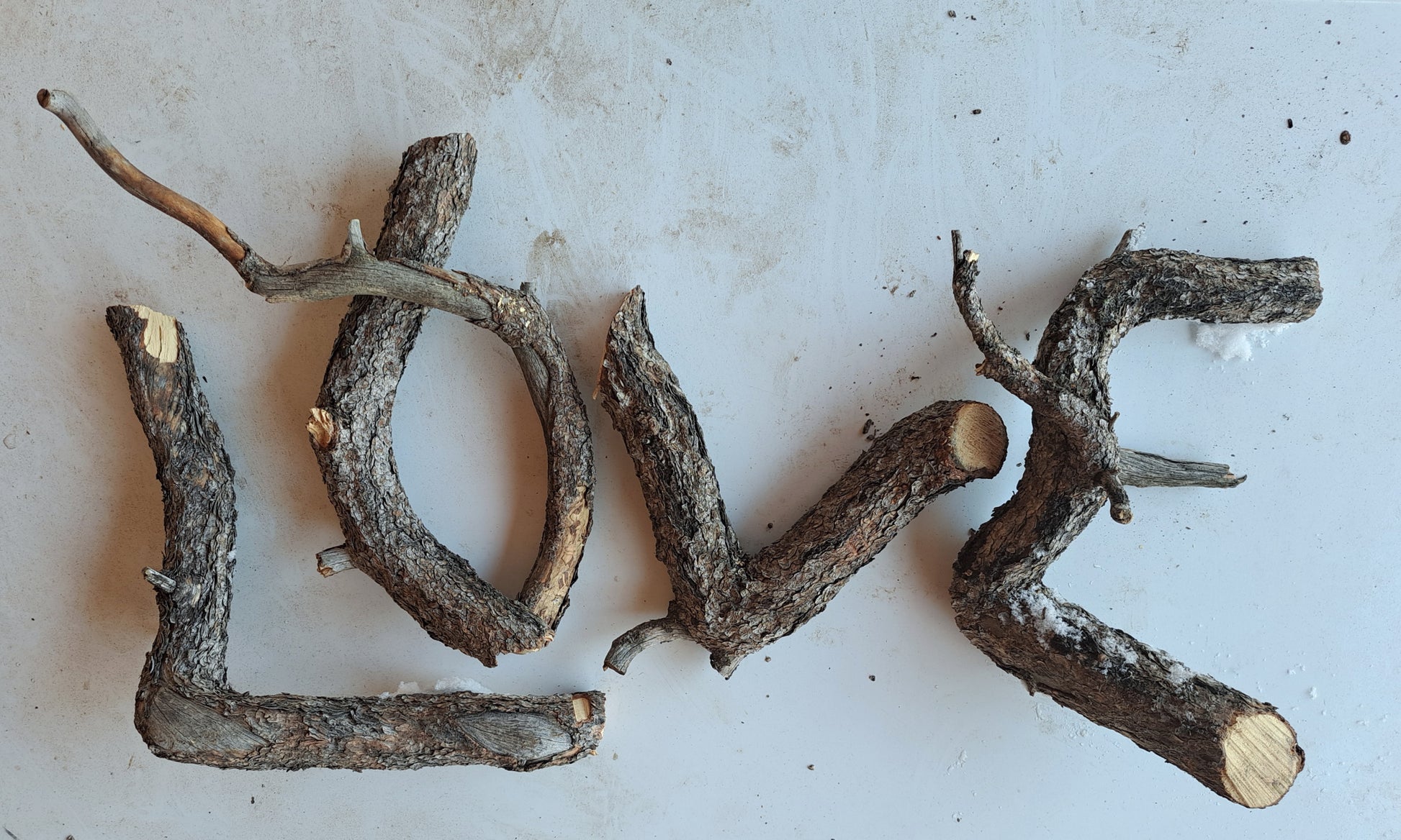 twisted wood spells the word love